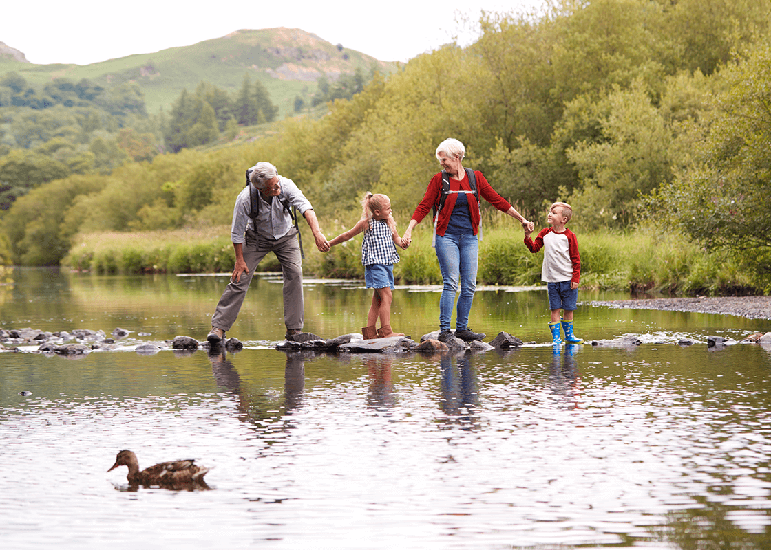 Family on stepping stones