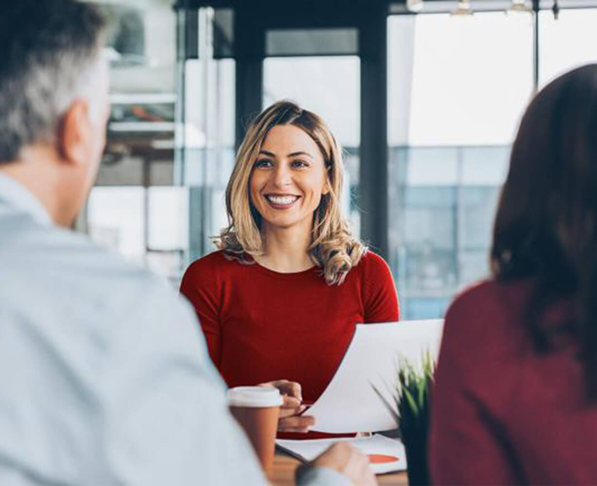 Female adviser with clients