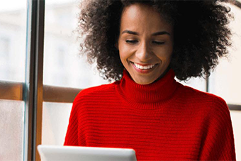 Woman reading from tablet