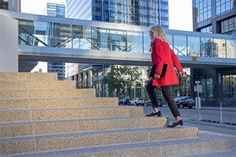 person walking up steps