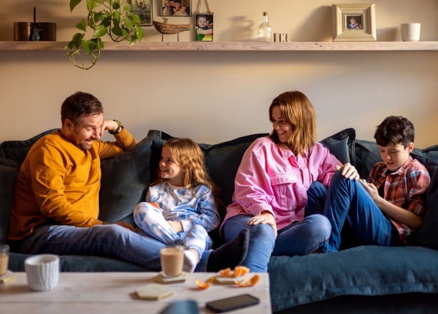 Family sat on the sofa
