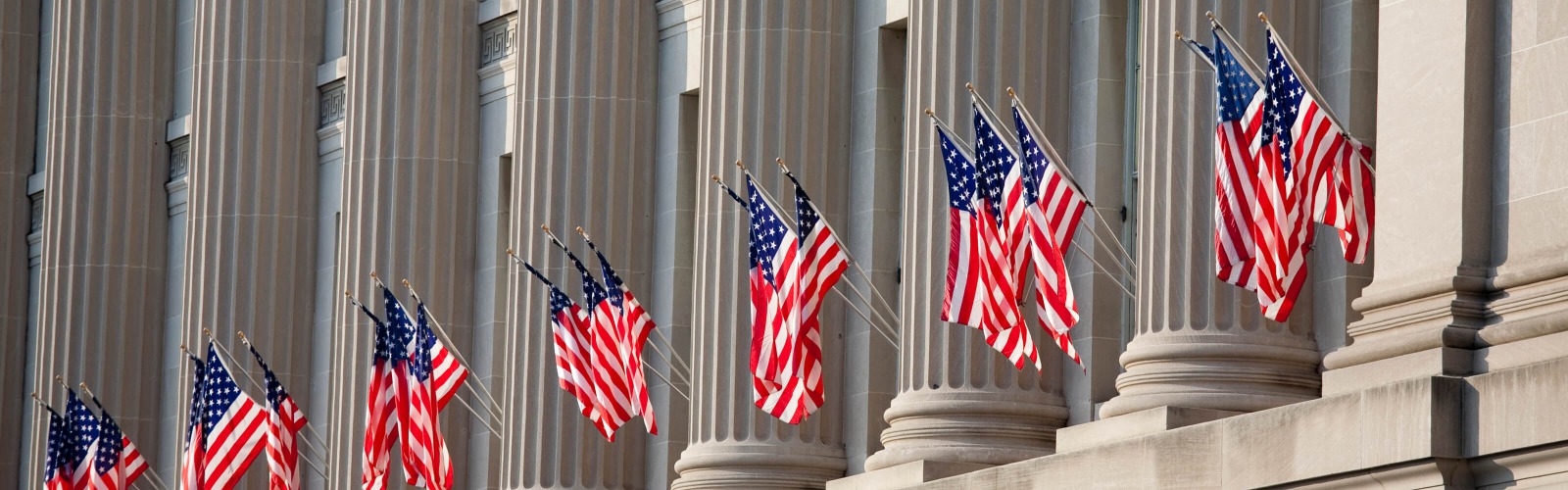 USA flags on building columns 