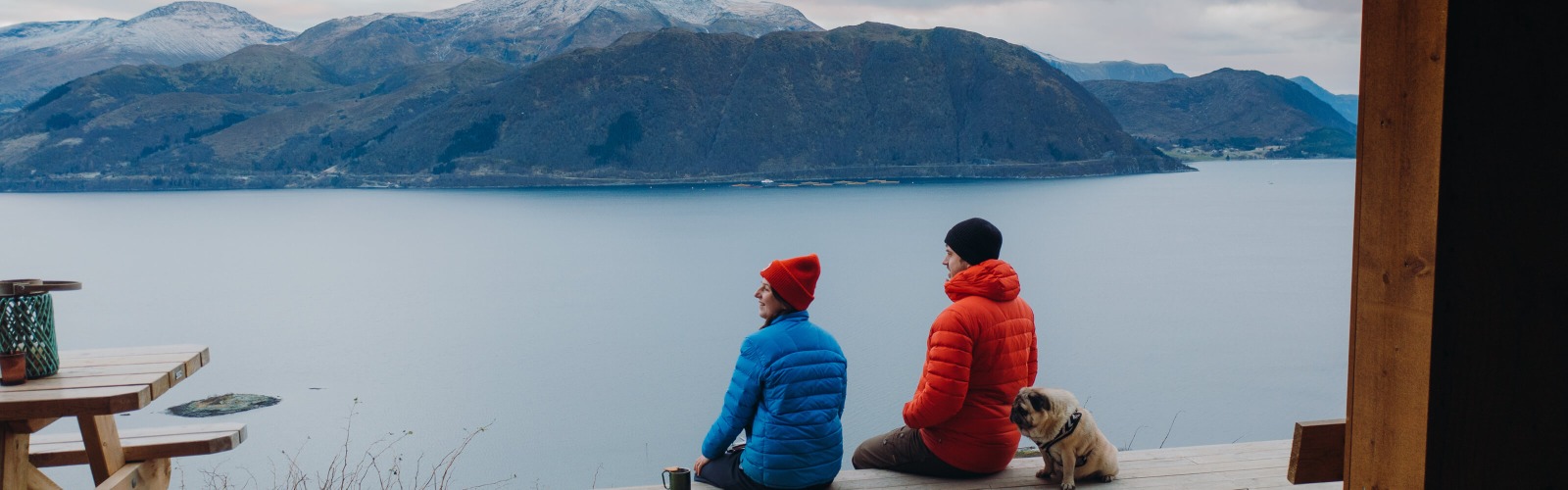 couple looking out across river