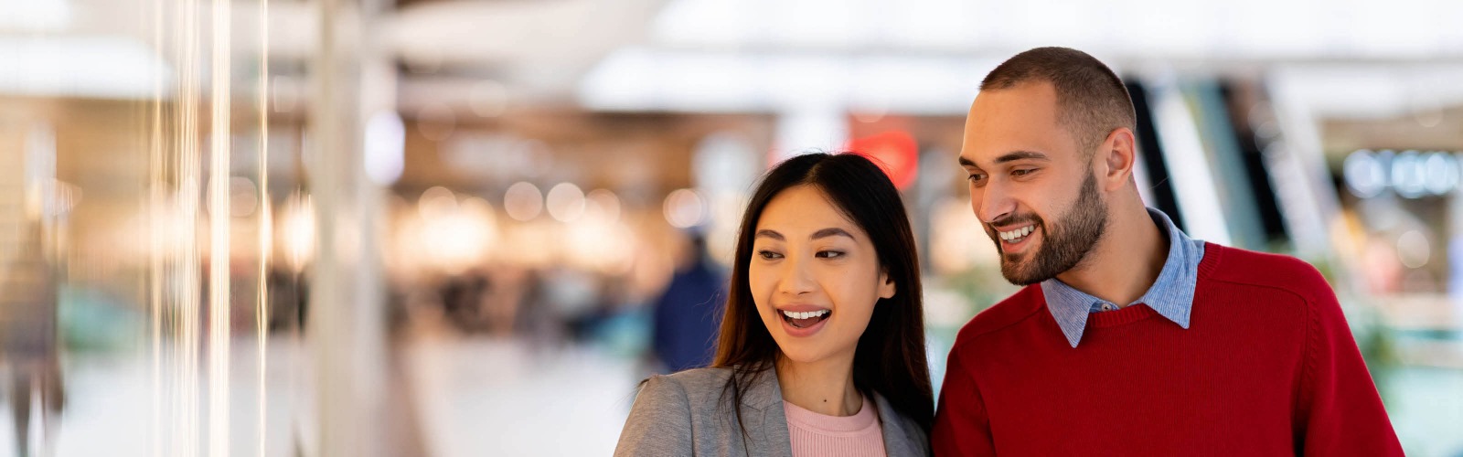 couple shopping in shopping centre
