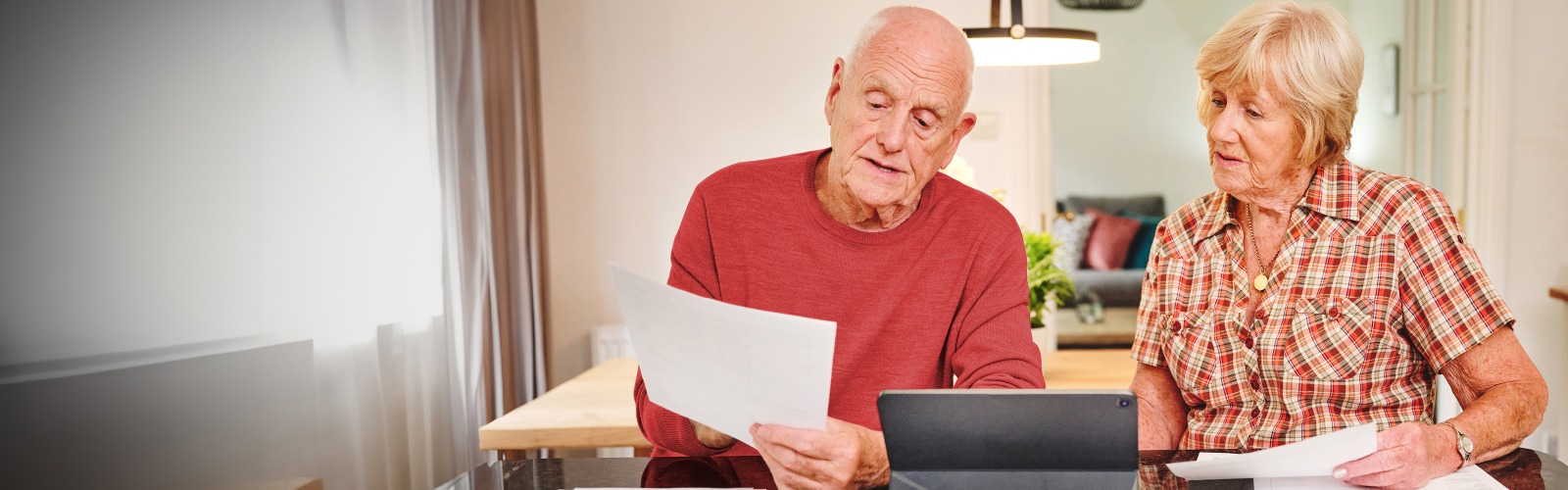 Couple reading documents 