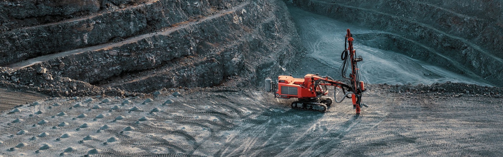 Red digger mining for metal