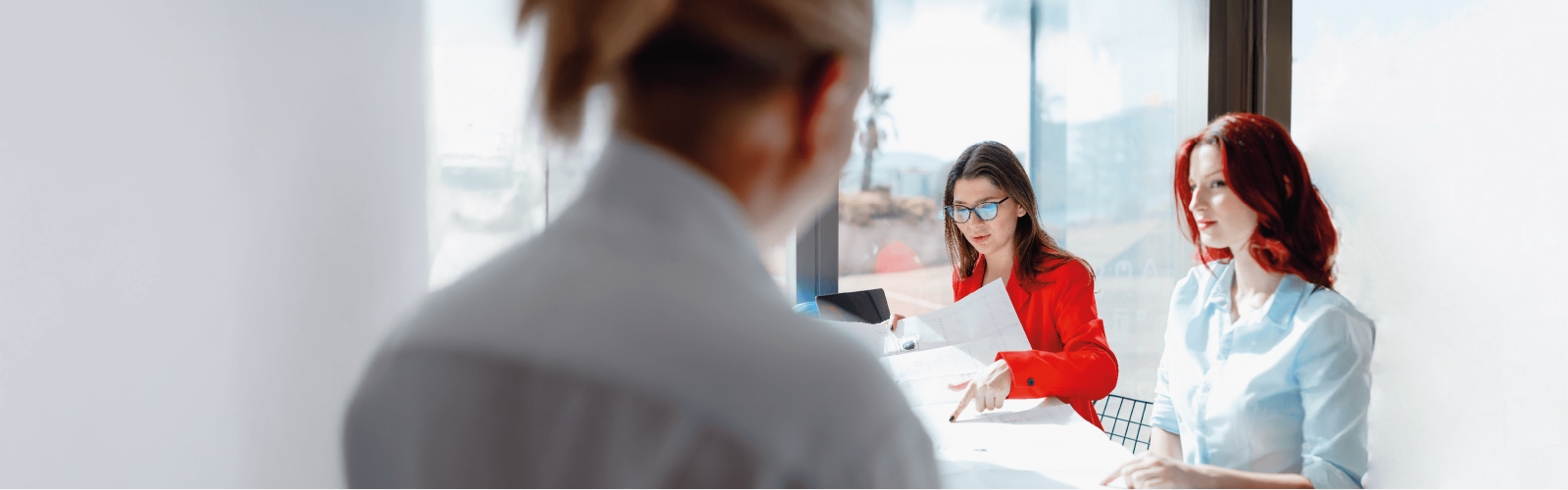Three women in a meeting