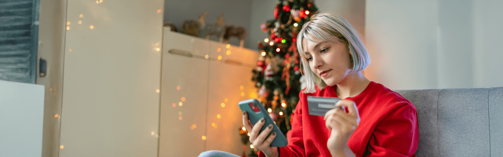 Woman holding credit card