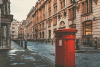 Red post box on the street